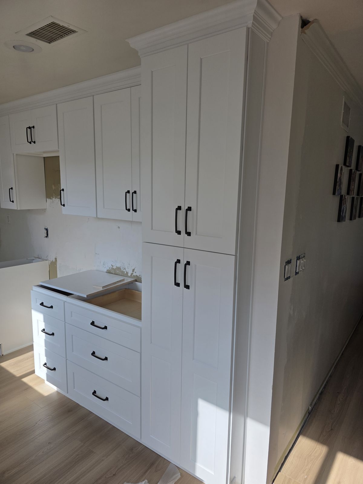 Tall pantry cabinets installed during kitchen remodel, Buena Park