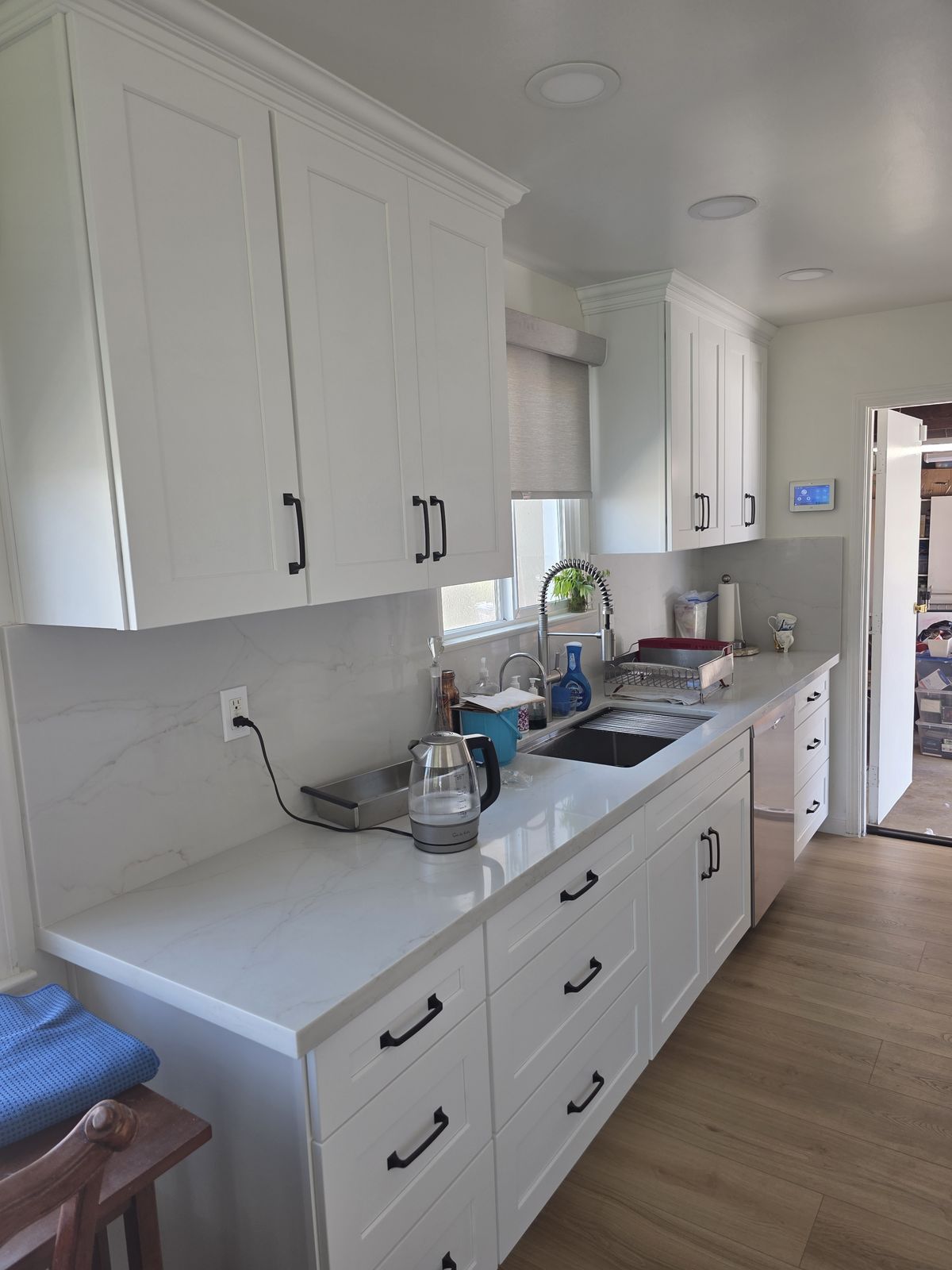 Quartz countertops with full-height backsplash and undermount sink, Buena Park